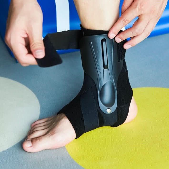 Stability Knöchelbandage mit ergonomischer Unterstützung, doppelten Stabilisatoren und Grip-Technologie