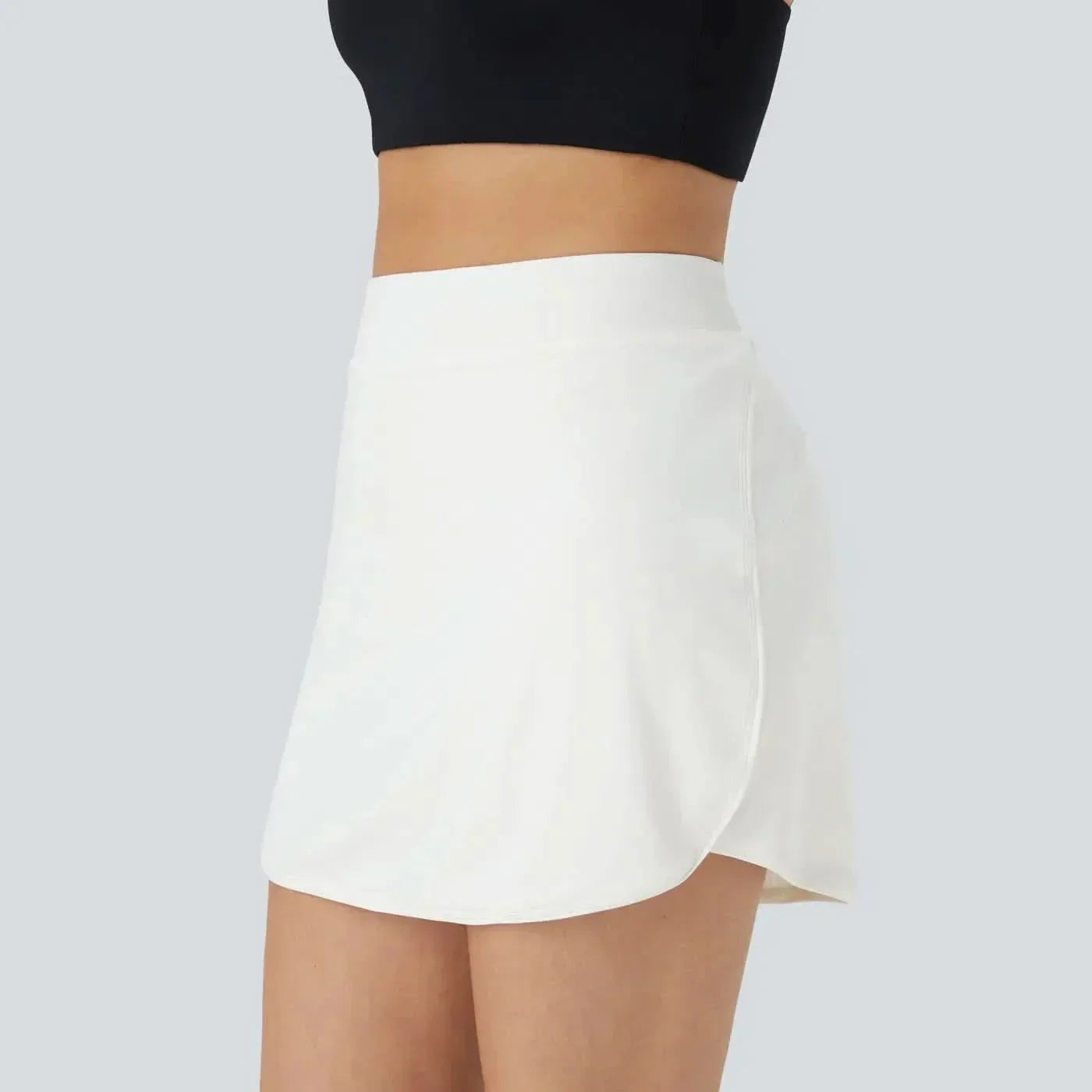 Jupe de Golf Nova 2-en-1 Micro Jupe avec Poches Cachées et Ceinture Haute Plate