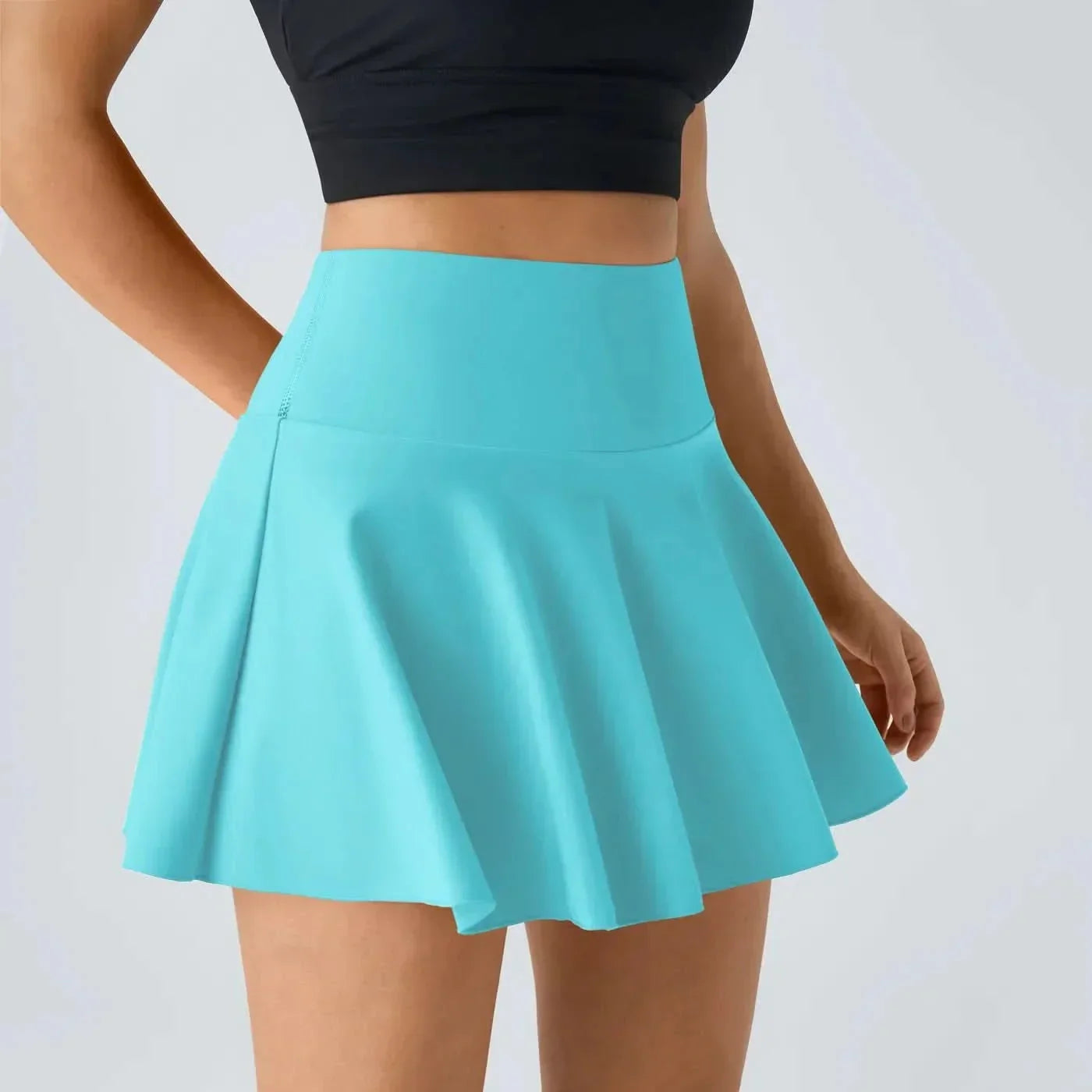 AeroLuxe 2v1 vzdušná tenisová sukně s integrovanými šortkami a ochranou UPF50 Plus
