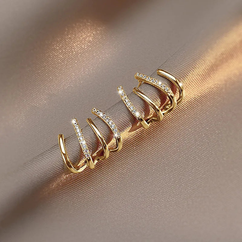 Boucles d'oreilles Astra Twist pour femmes, bijoux légers et remarquables, finition hypoallergénique | Fervei