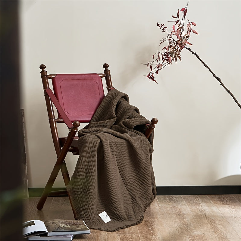 Manta con Flecos Elegante para una Relajación Estilizada en el Hogar