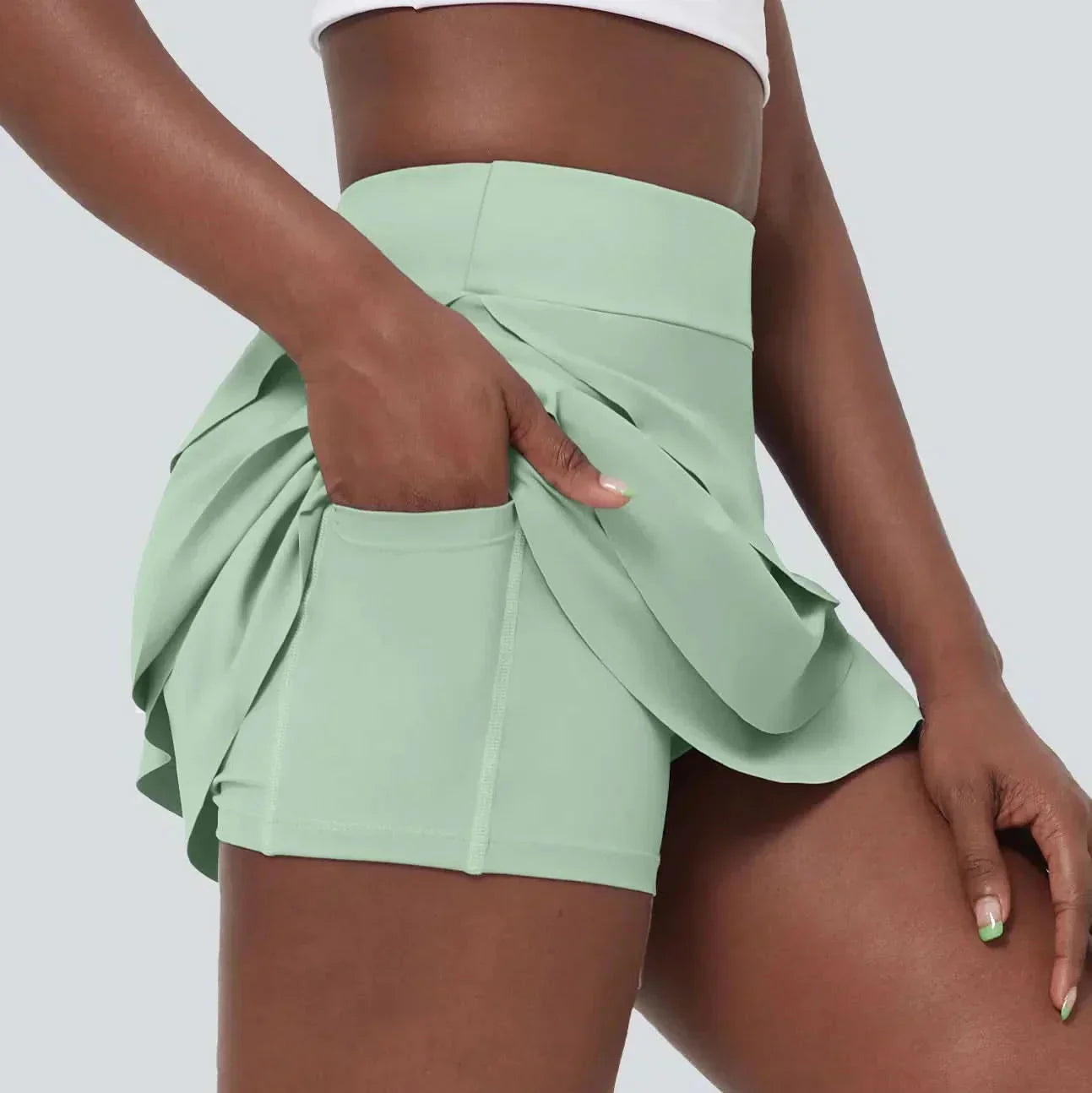 AeroBloom Airy 2 az 1-ben golf szoknya réteges kialakítással és zsebekkel