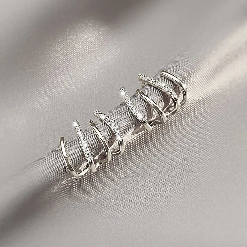 Boucles d'oreilles Astra Twist pour femmes, bijoux légers et remarquables, finition hypoallergénique | Fervei