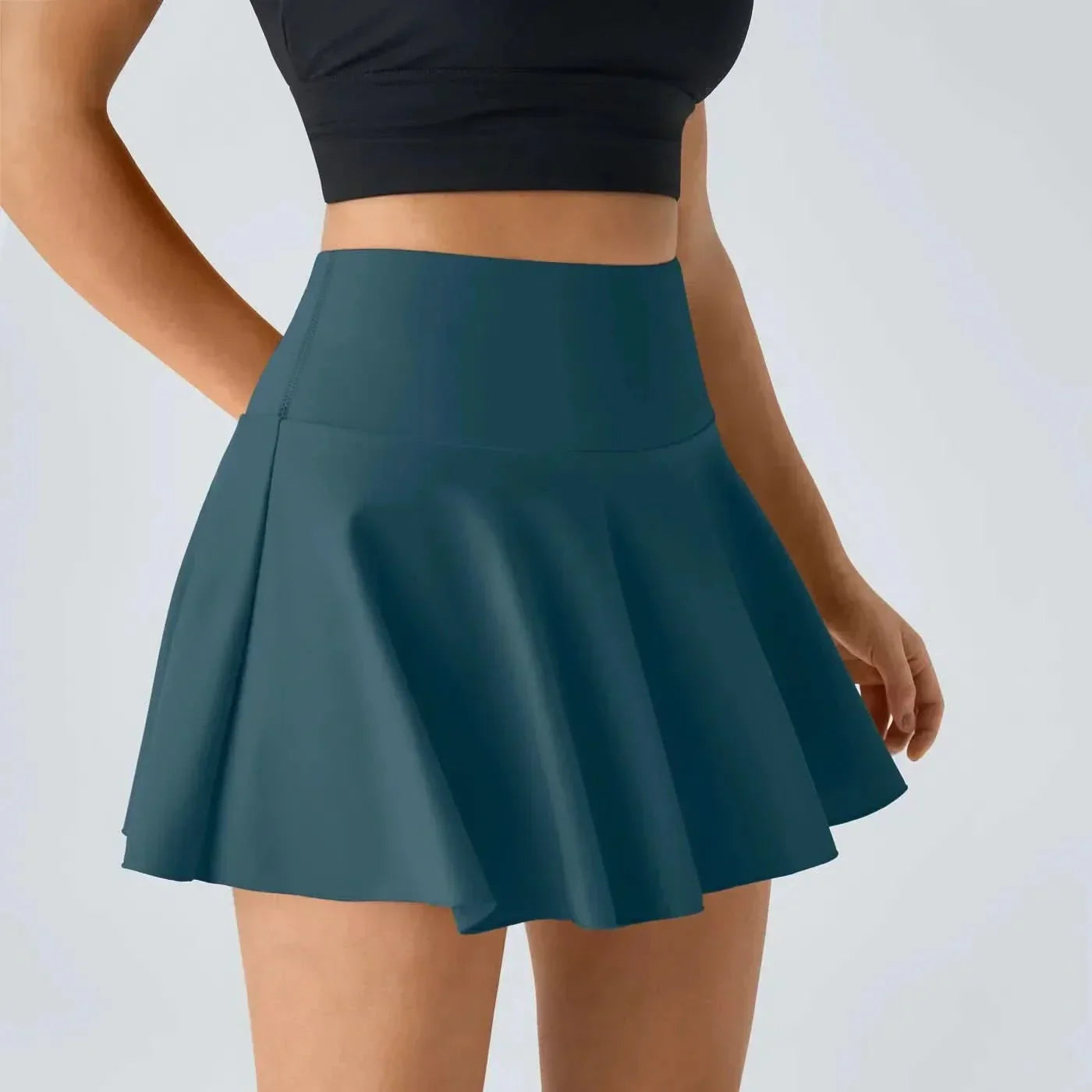 AeroLuxe 2v1 vzdušná tenisová sukně s integrovanými šortkami a ochranou UPF50 Plus