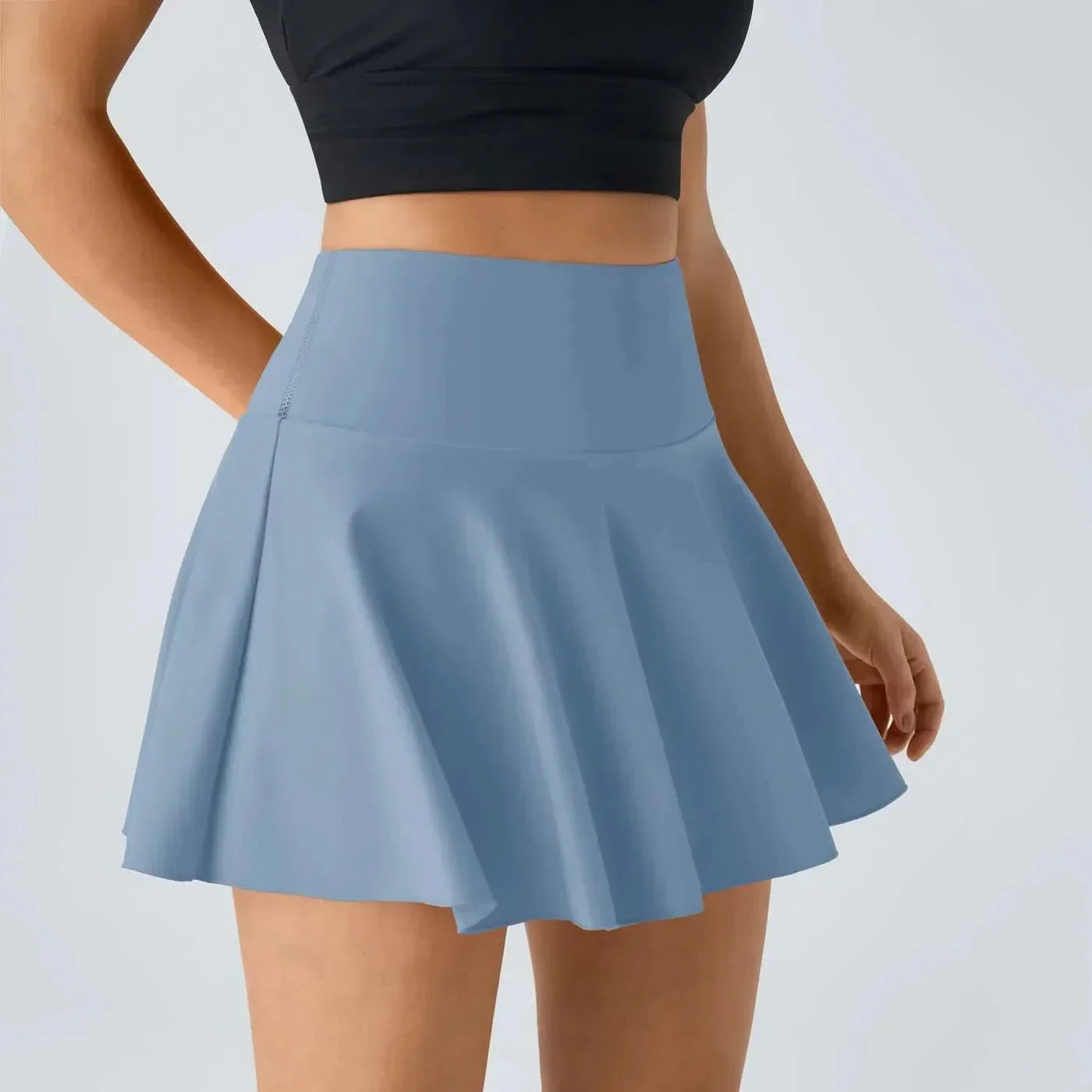 AeroLuxe 2v1 vzdušná tenisová sukně s integrovanými šortkami a ochranou UPF50 Plus