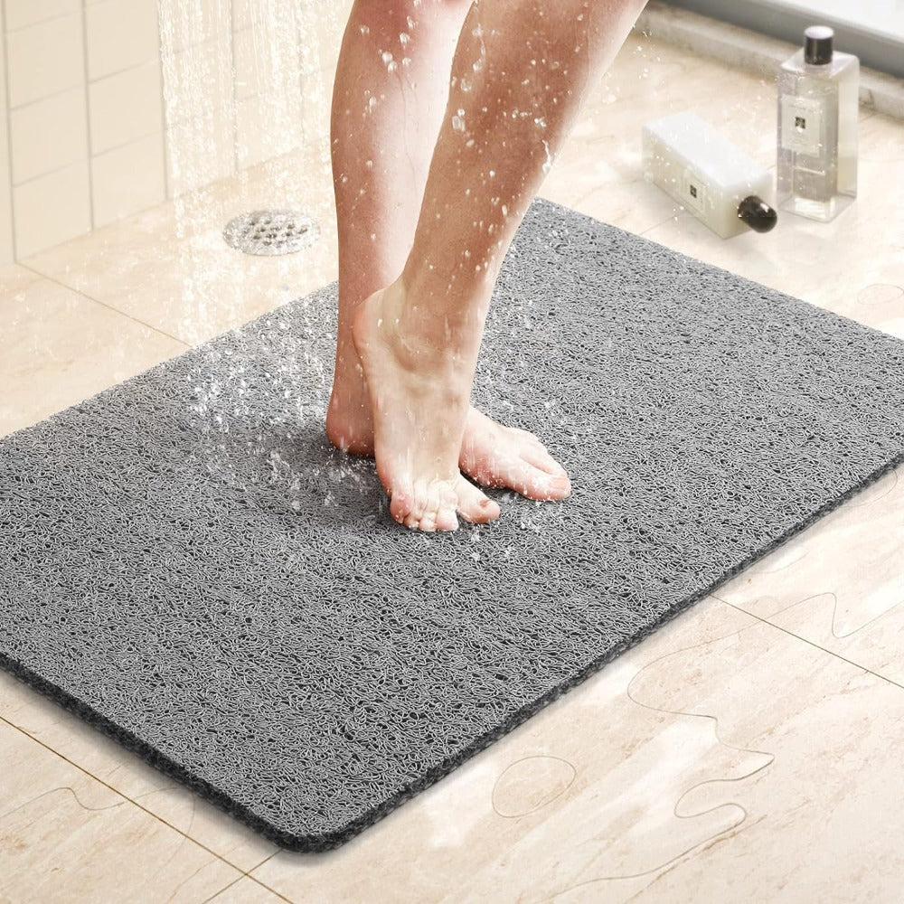 Tapete de duche antiderrapante concebido para um banho seguro, higiénico e confortável
