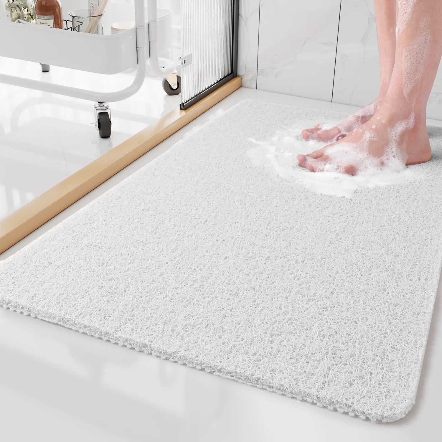 Tapete de duche antiderrapante concebido para um banho seguro, higiénico e confortável