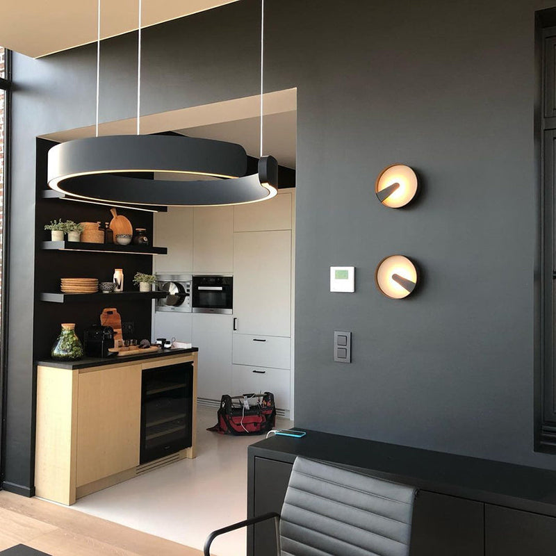 Lampa wisząca Lumera z podwójnym pierścieniem i ciepłym, brązowym blaskiem do nowoczesnych wnętrz