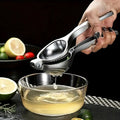 Stainless steel manual lemon squeezer for effortless juice extraction and maximum citrus yield