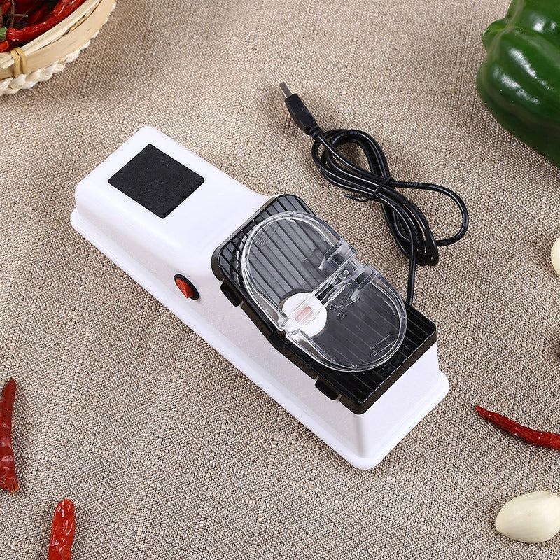 Elektrický brousek na nože do kuchyně s kompaktním úložným prostorem a minimalistickým designem