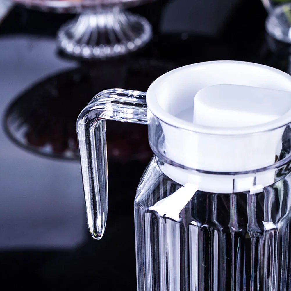 FlowEase 1,1L Kunststoff-Saftkanne mit robuster Konstruktion und ergonomischem Griff