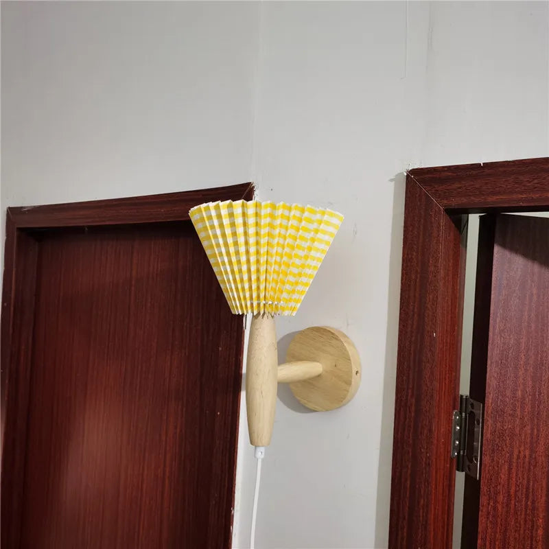 Lyren Wood Wall Sconce With A Pleated Shade For Cozy Warm Ambient Glow
