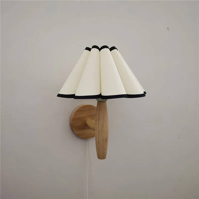 Lyren Wood Wall Sconce With A Pleated Shade For Cozy Warm Ambient Glow