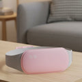 CalmWaves Elektrisches Bauchheizkissen mit Vibration zur Schmerzlinderung