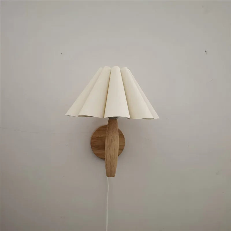 Lyren Wood Wall Sconce With A Pleated Shade For Cozy Warm Ambient Glow