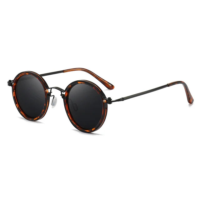 Gafas de sol redondas retro Ricco Milano con estilo atemporal