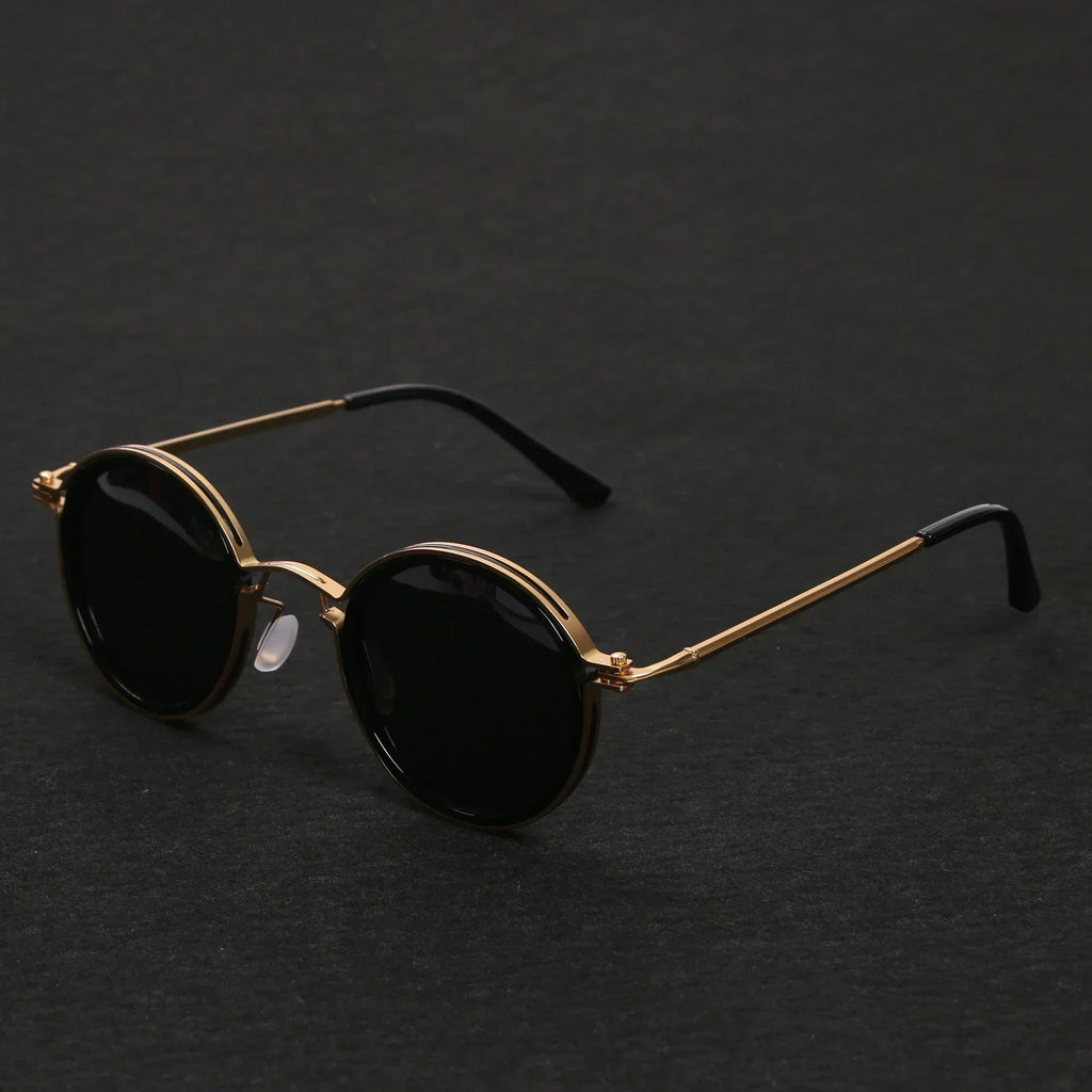 Gafas de sol redondas retro Ricco Milano con estilo atemporal