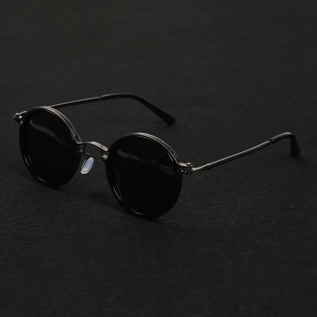 Gafas de sol redondas retro Ricco Milano con estilo atemporal