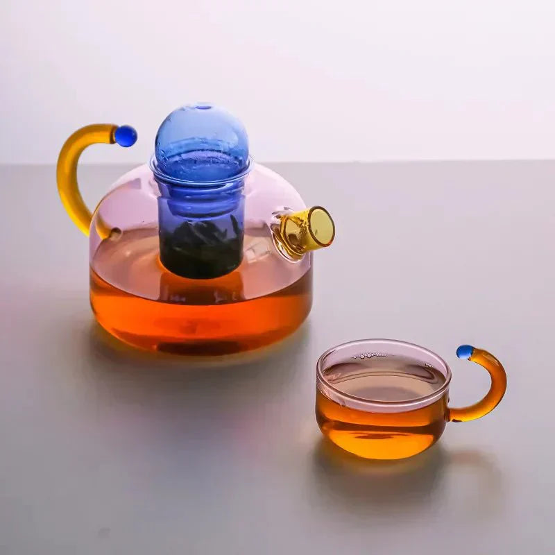 Translucent Glass Kettle And Mug Set With Bold Color Contrast