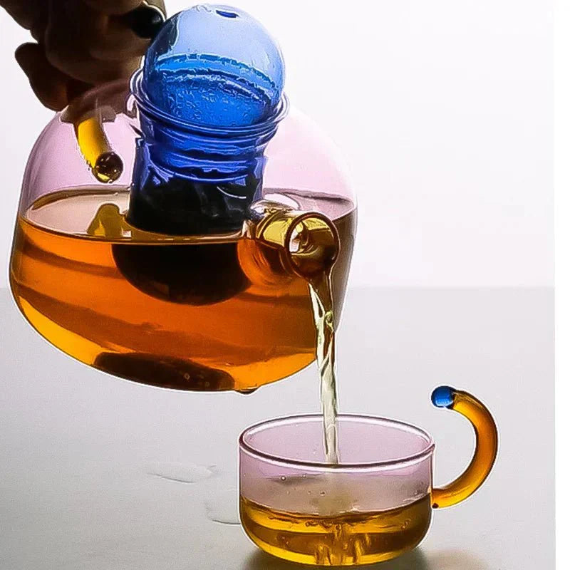 Translucent Glass Kettle And Mug Set With Bold Color Contrast