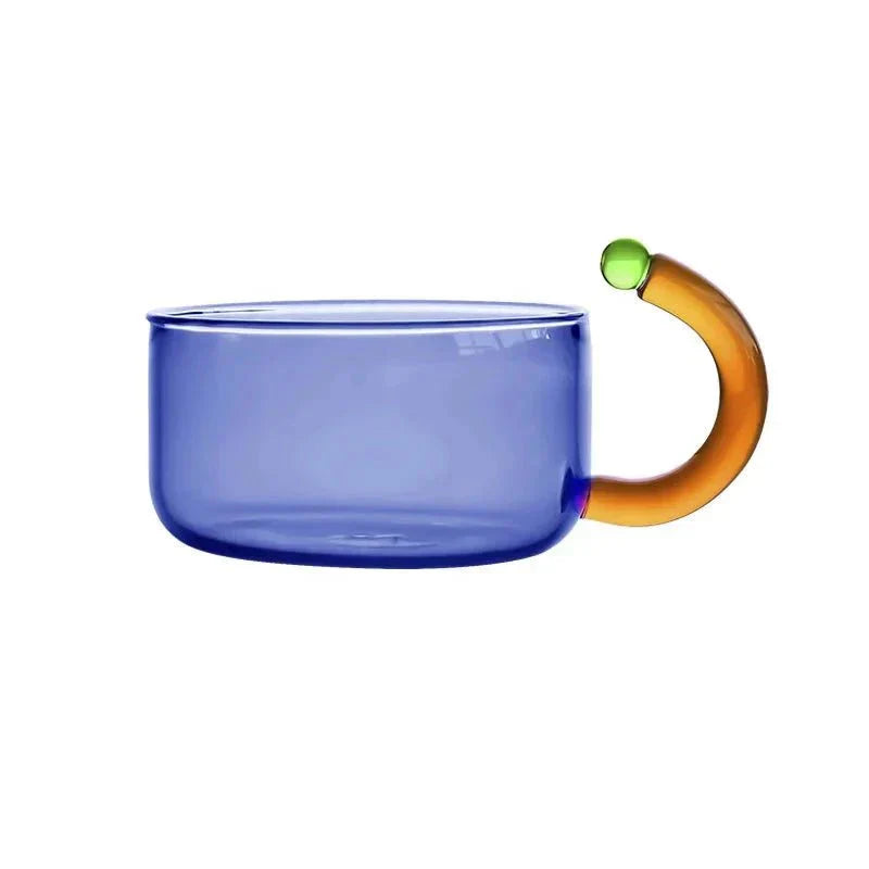 Translucent Glass Kettle And Mug Set With Bold Color Contrast