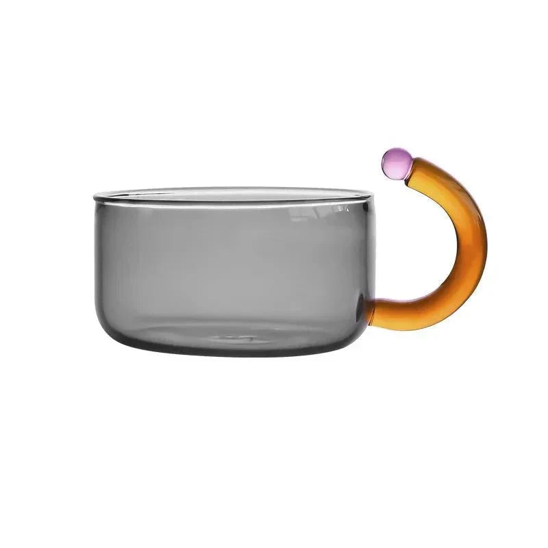 Translucent Glass Kettle And Mug Set With Bold Color Contrast