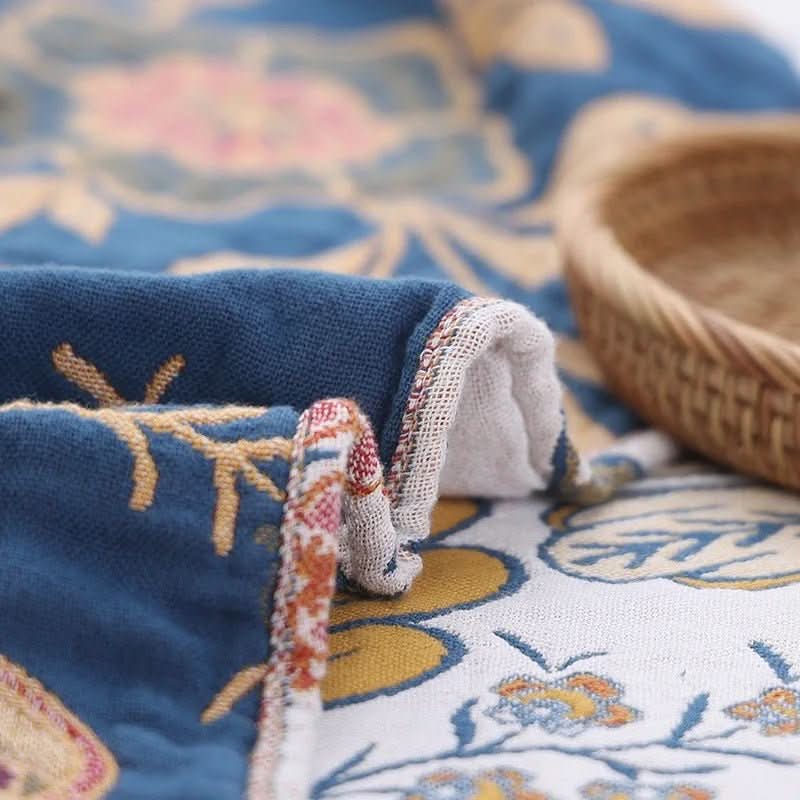 Coperta MEADOWNEST in cotone rustico con motivo floreale e design reversibile