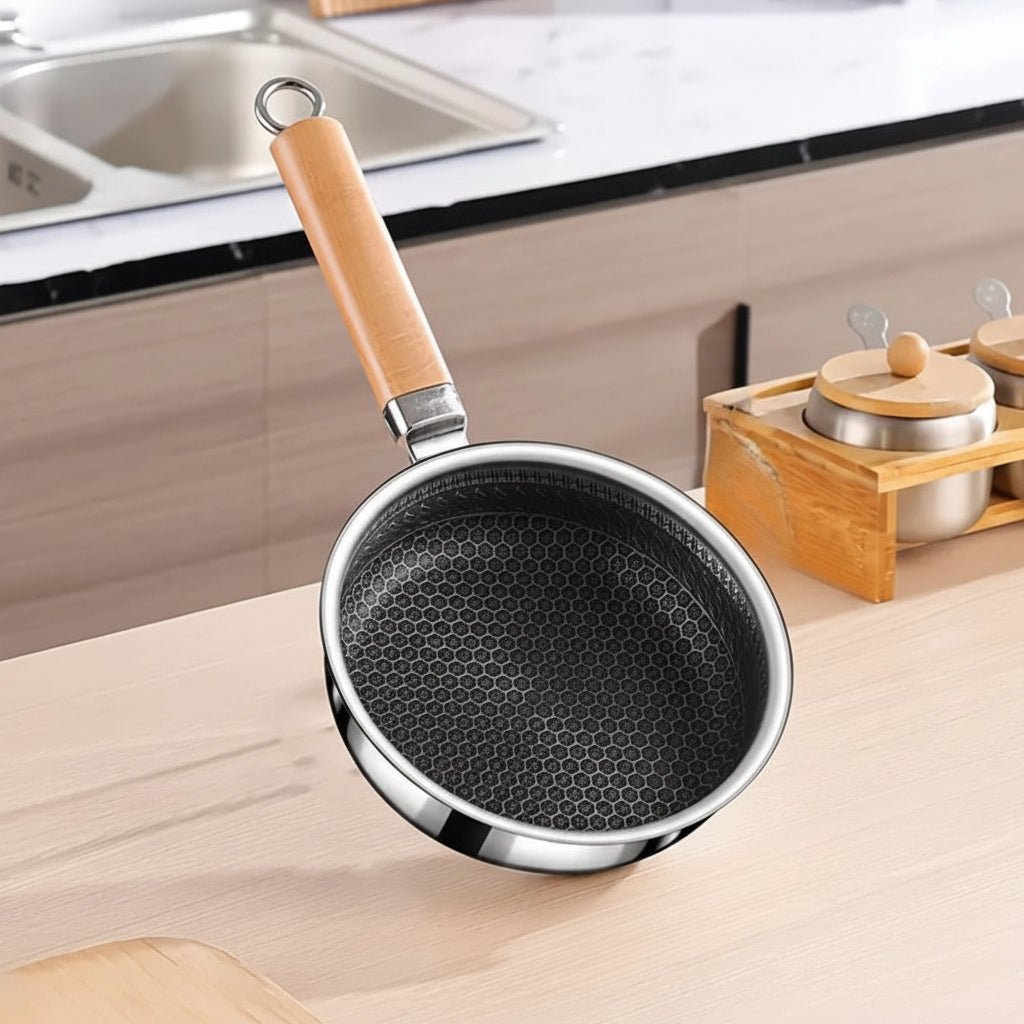 Padella in acciaio inox antiaderente METALZEN con controllo della presa bilanciato