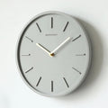 Lundra Wall Clock With Metal Pendant And Cement Texture